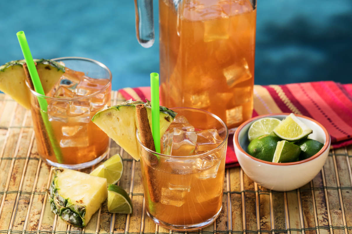 Two Glasses Of Pineapple Cinnamon Iced Tea Margaritas