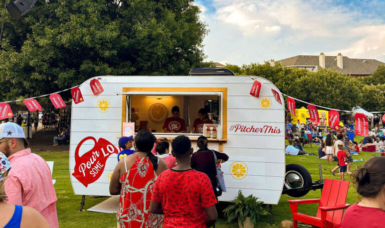 Luzianne's vintage camper at a festival