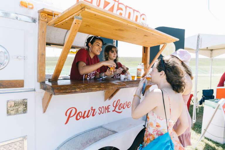 Luzianne Tea booth, serving tea at a festival