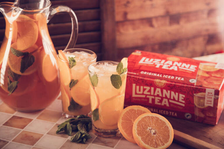 pitcher and glasses of orange mint tea