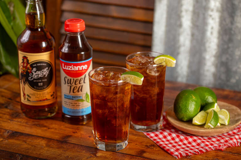 Two glasses of Sweet & Spicy Spiked Sweet Tea Cocktail made with rum.